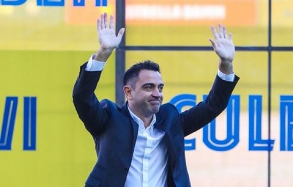 Barcelona unveil Xavi as new coach